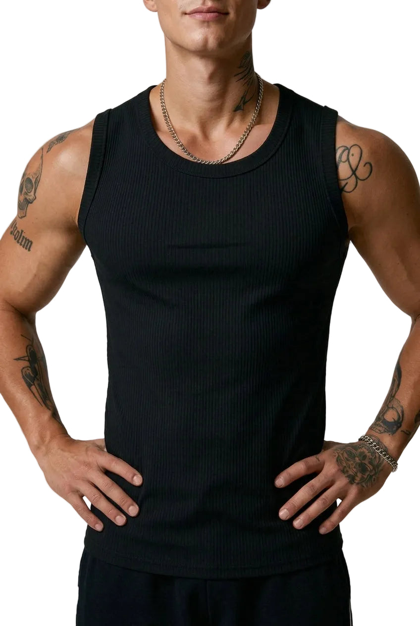 Person wearing a black tank top with tattoos on arms and neck.