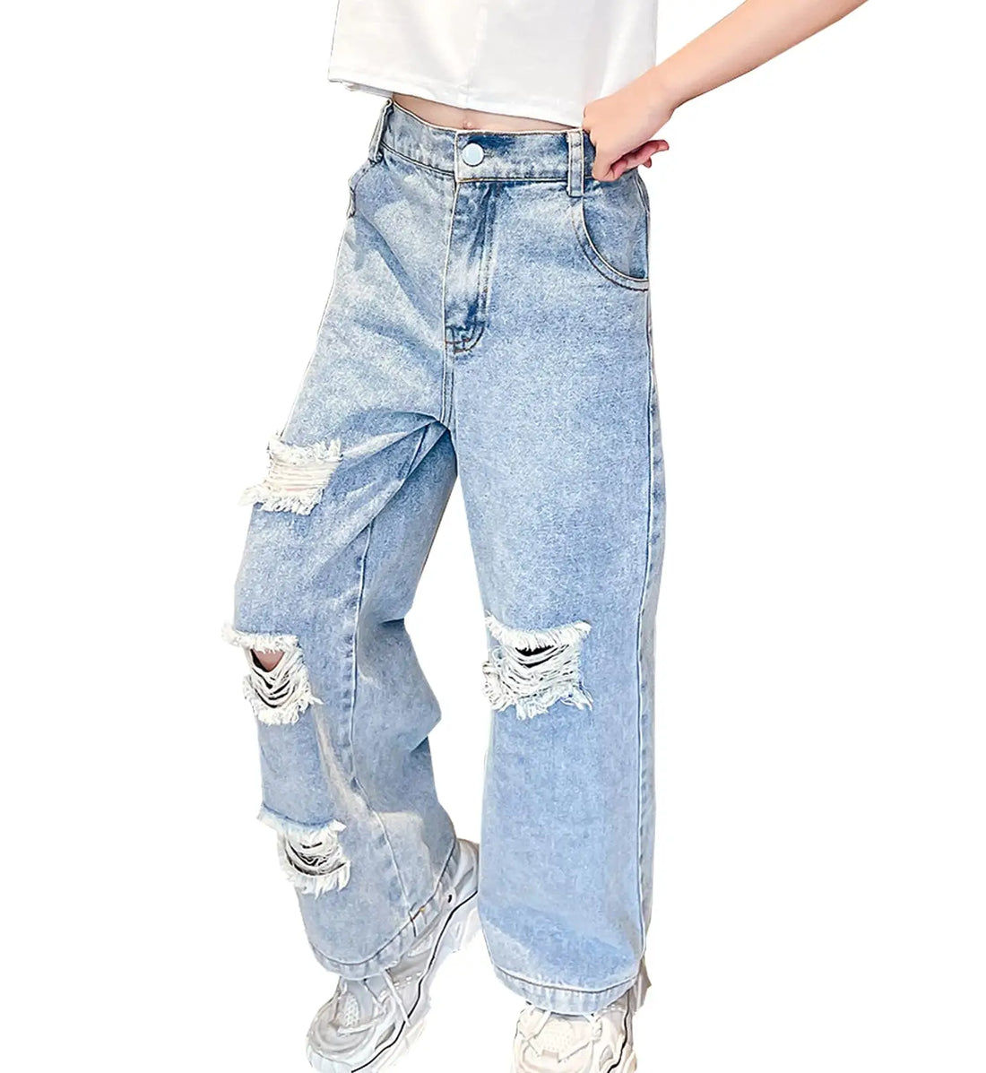 Light wash blue distressed wide-leg jeans with ripped details on the thighs and lower legs, shown on a model wearing a white crop top and white sneakers against a plain white background.
