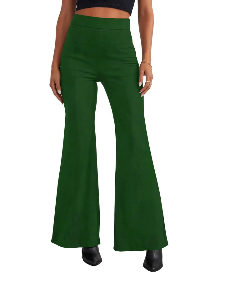 A model wearing high-waisted, wide-leg green pants with black pointed-toe heels, shown from the waist down on a plain white background.