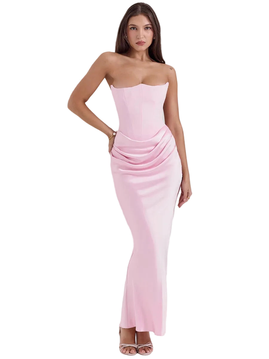 Woman wearing a pink strapless gown on a white background
