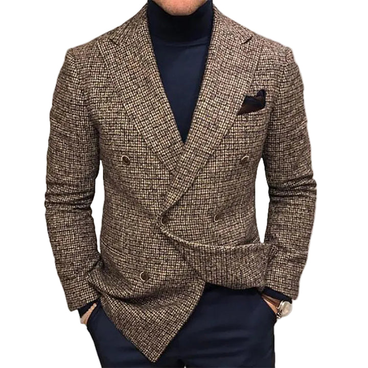 Brown checkered blazer worn by a person on a gray background
