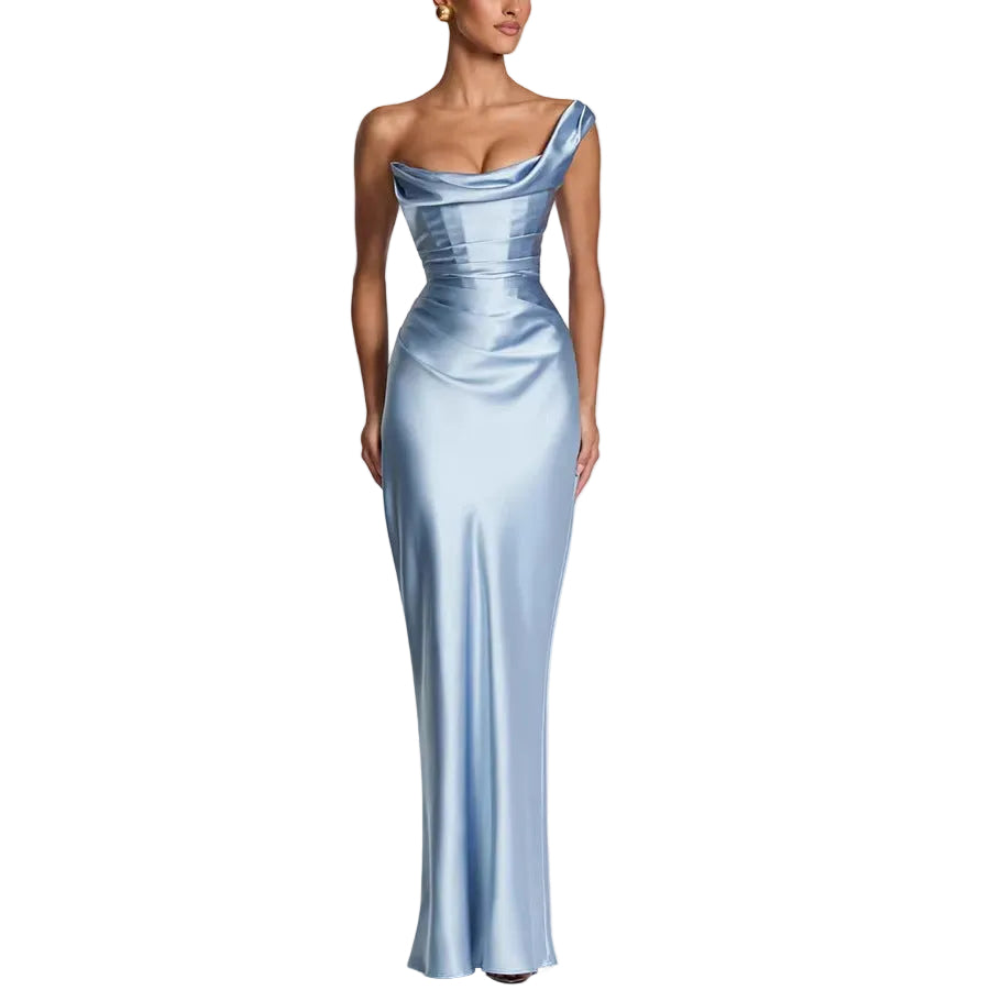 Woman wearing a light blue satin gown on a white background