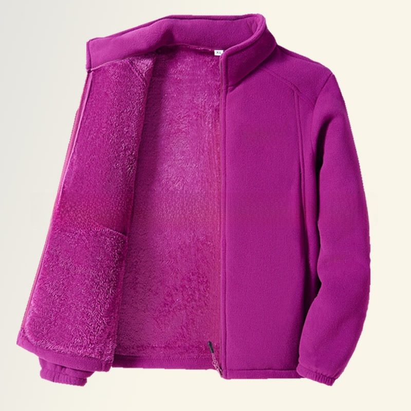A purple fleece jacket with a plush sherpa lining, shown open against a light cream background.