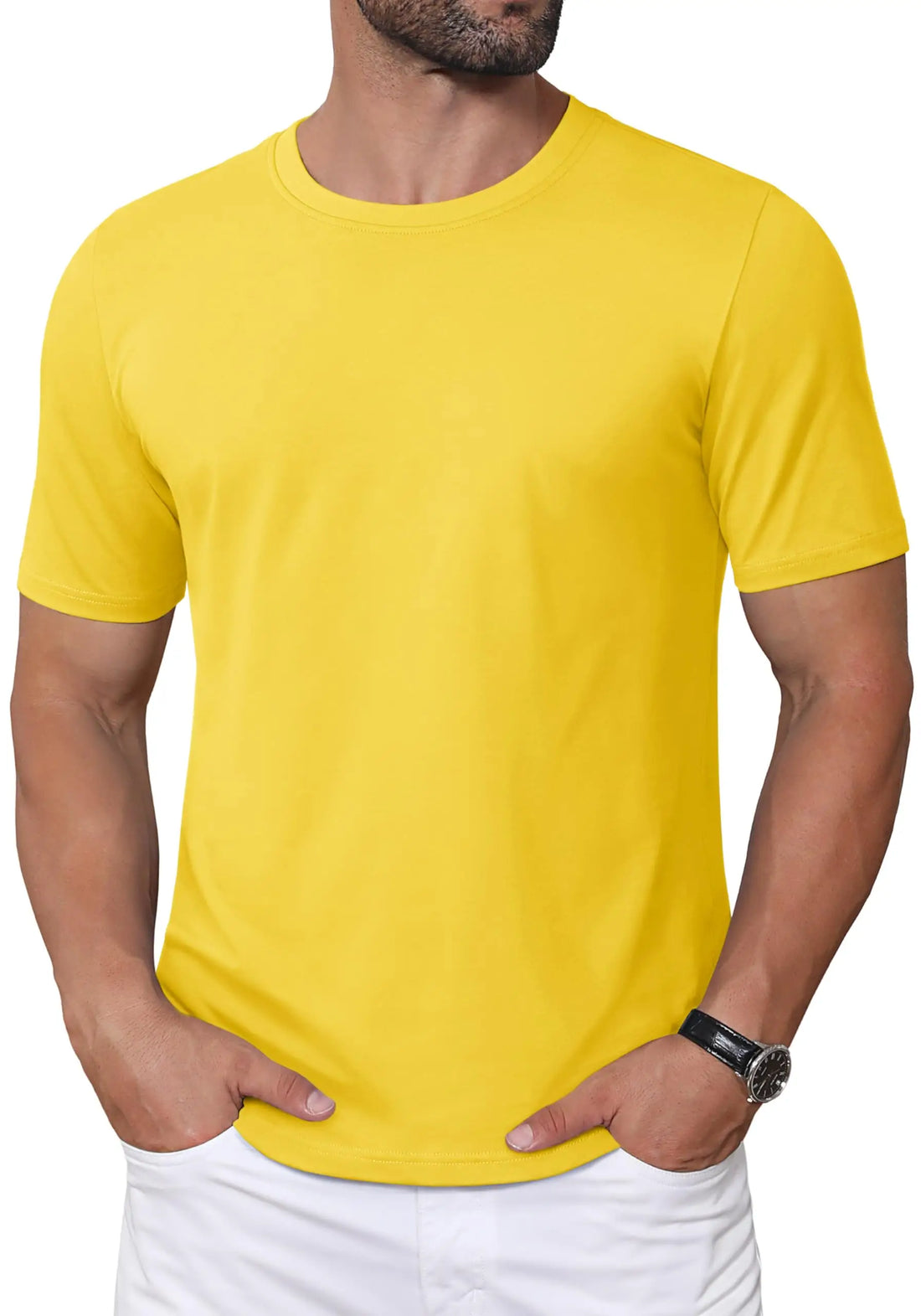 Man wearing a yellow t-shirt with white pants on a white background