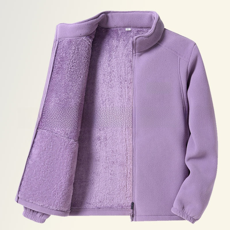 A light purple fleece jacket with a matching plush sherpa lining, shown open against a solid off-white background.