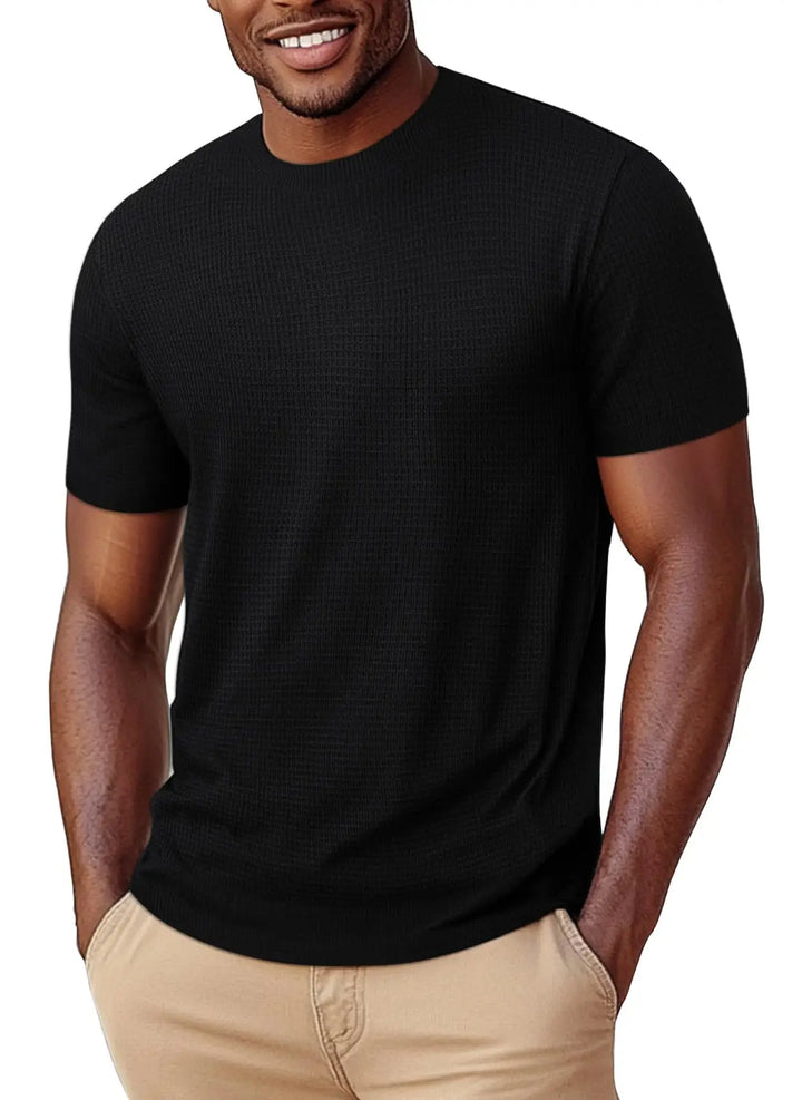 Man wearing a black t-shirt on a white background
