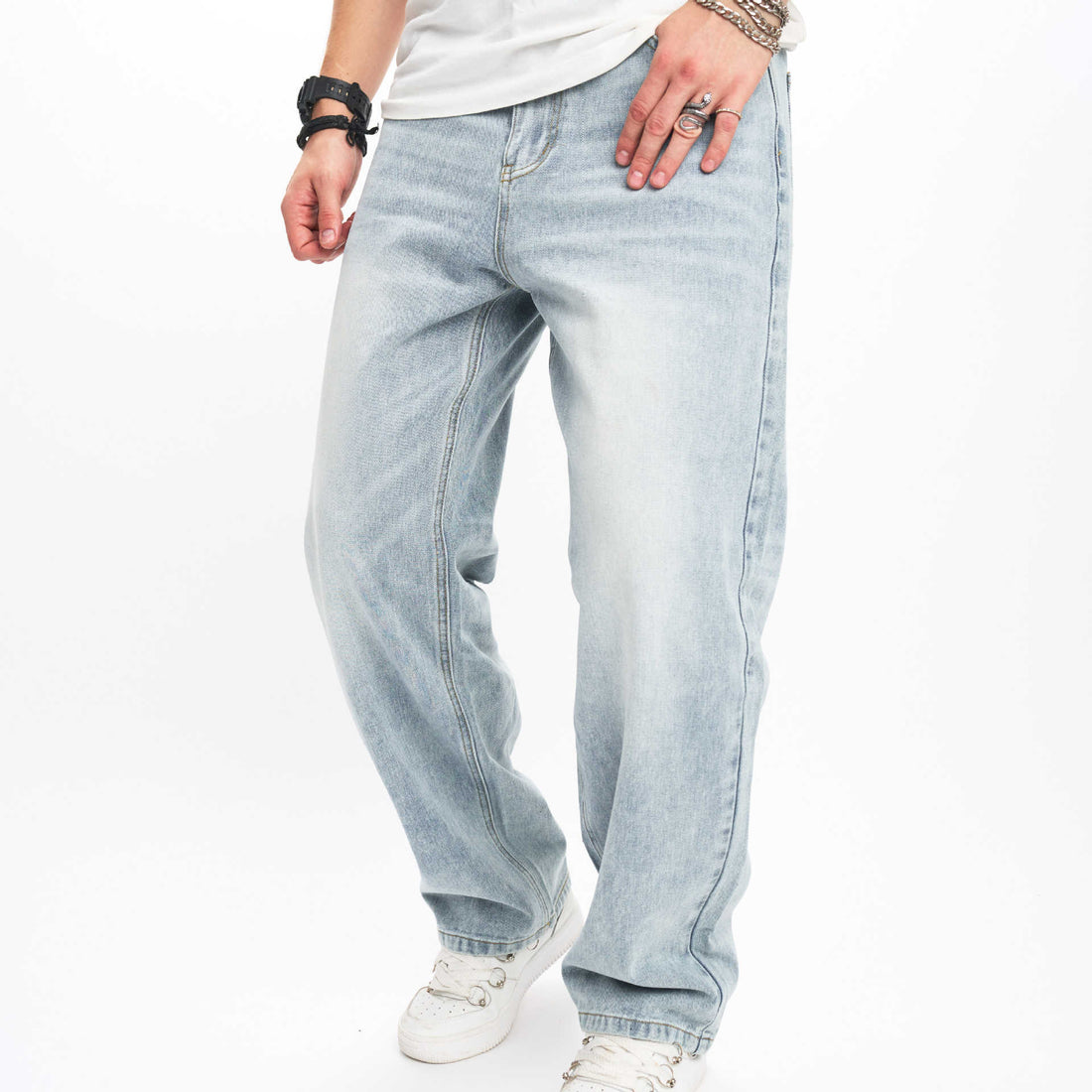 Light blue jeans worn by a person on a white background