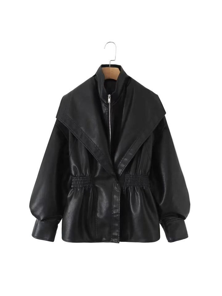 A black faux-leather jacket with a wide lapel, front zipper, and elasticized waist, hanging on a wooden hanger against a plain white background.