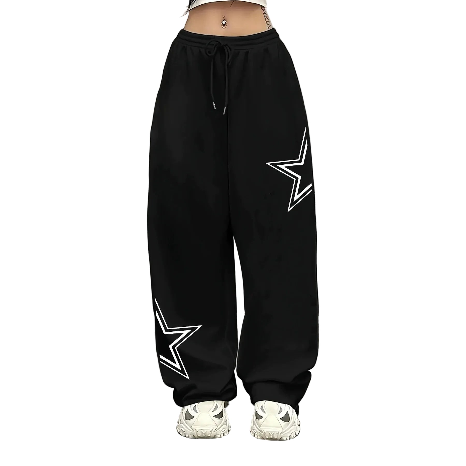 Black wide-leg sweatpants with white outlined star graphics on both legs, shown on a model from the waist down wearing white sneakers.
