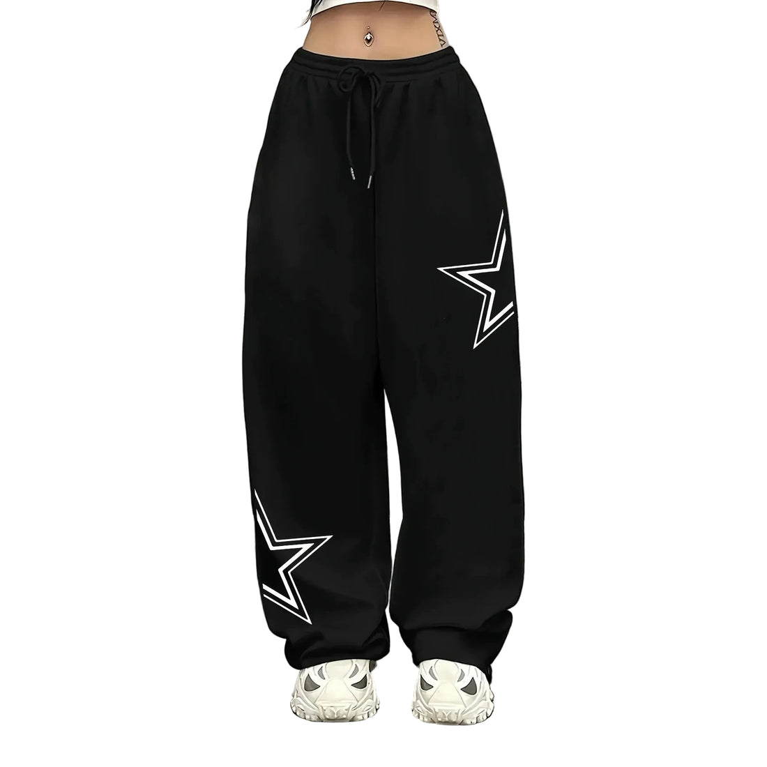 Black wide-leg sweatpants with white outlined star graphics on both legs, shown on a model from the waist down wearing white sneakers.