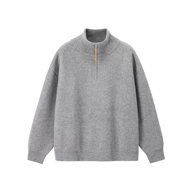 A light gray ribbed knit half-zip sweater with a high mock neck and a small orange zipper pull, shown against a plain white background.