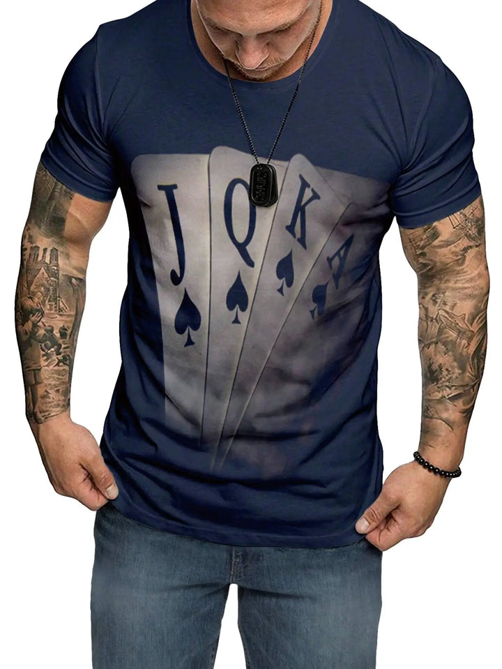 Man wearing a navy blue t-shirt with a graphic of playing card suits and text.