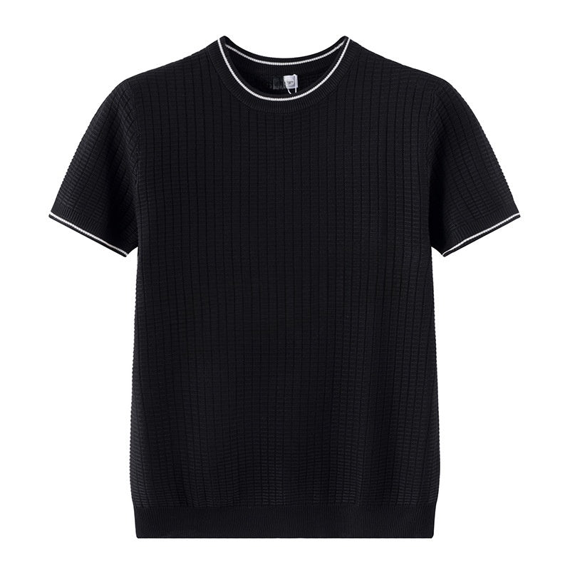 A black short-sleeve knit sweater with a textured waffle pattern, featuring white contrast piping along the crew neck and sleeve cuffs, displayed on a solid white background.