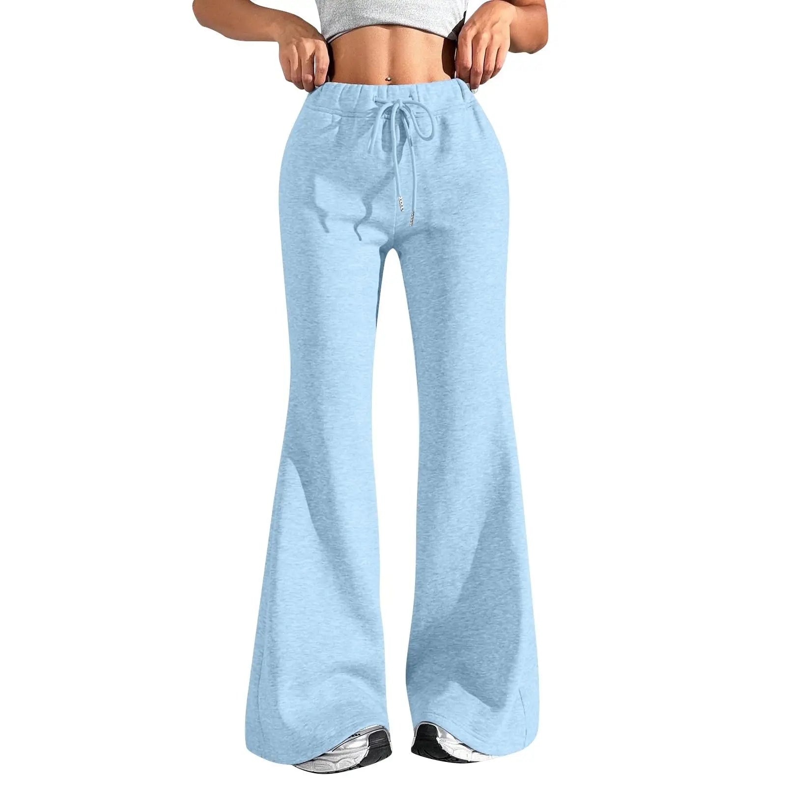 Light blue drawstring pants worn by a person on a white background