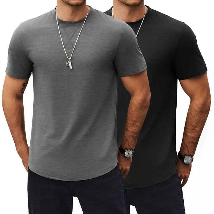 Two men modeling short-sleeve crew-neck t-shirts, with one in heather gray in front and one in black behind, both wearing silver necklaces and dark pants against a plain white background.