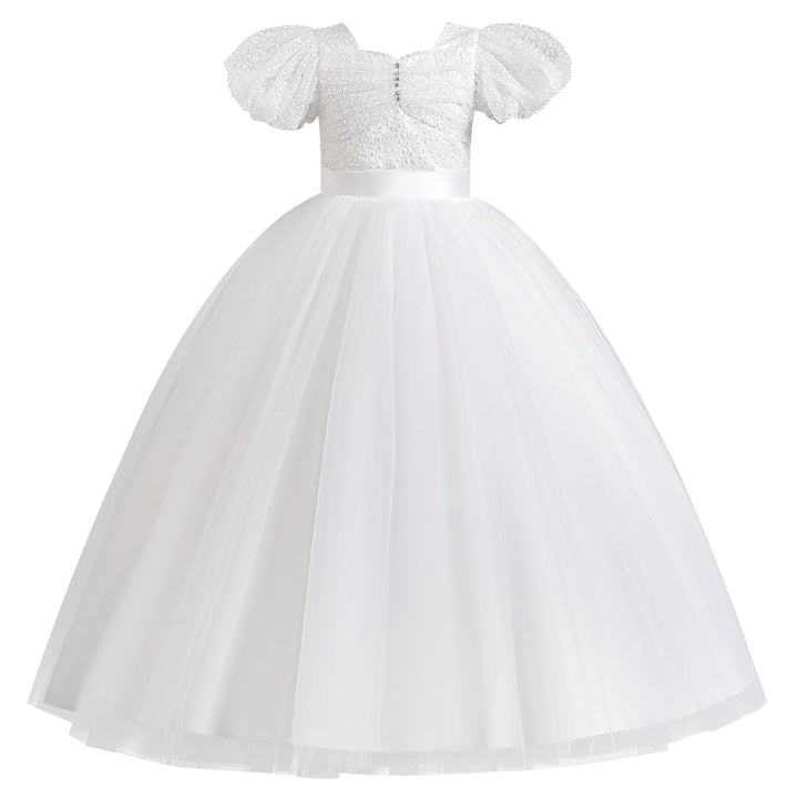 White lace dress with a tulle skirt on a white background