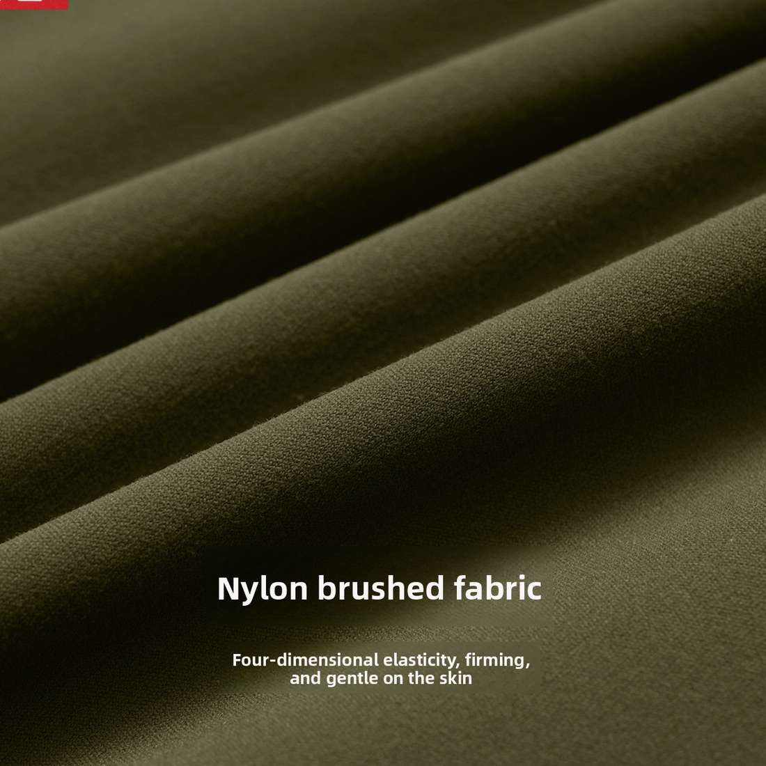 Close-up of olive green nylon brushed fabric with soft folds and white text reading 'Nylon brushed fabric' and 'Four-dimensional elasticity, firming, and gentle on the skin'.