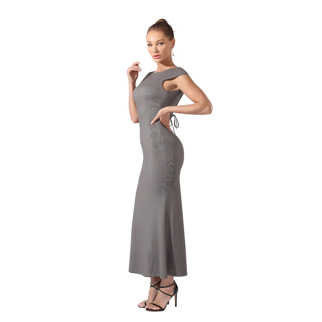 Woman wearing a gray dress on a white background