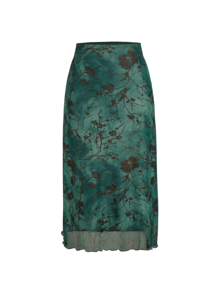 Teal floral patterned skirt on a white background