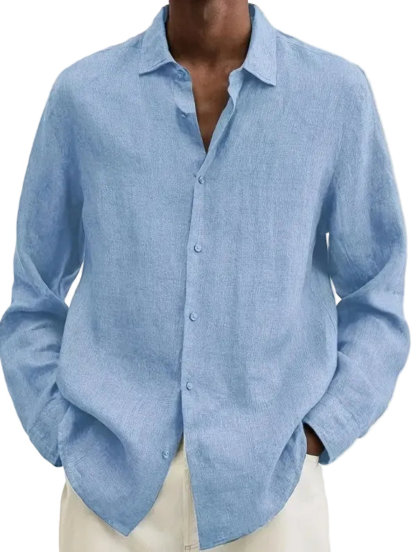 Blue linen shirt worn by a person on a beige background