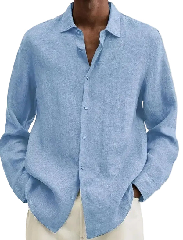 Blue linen shirt worn by a person on a beige background
