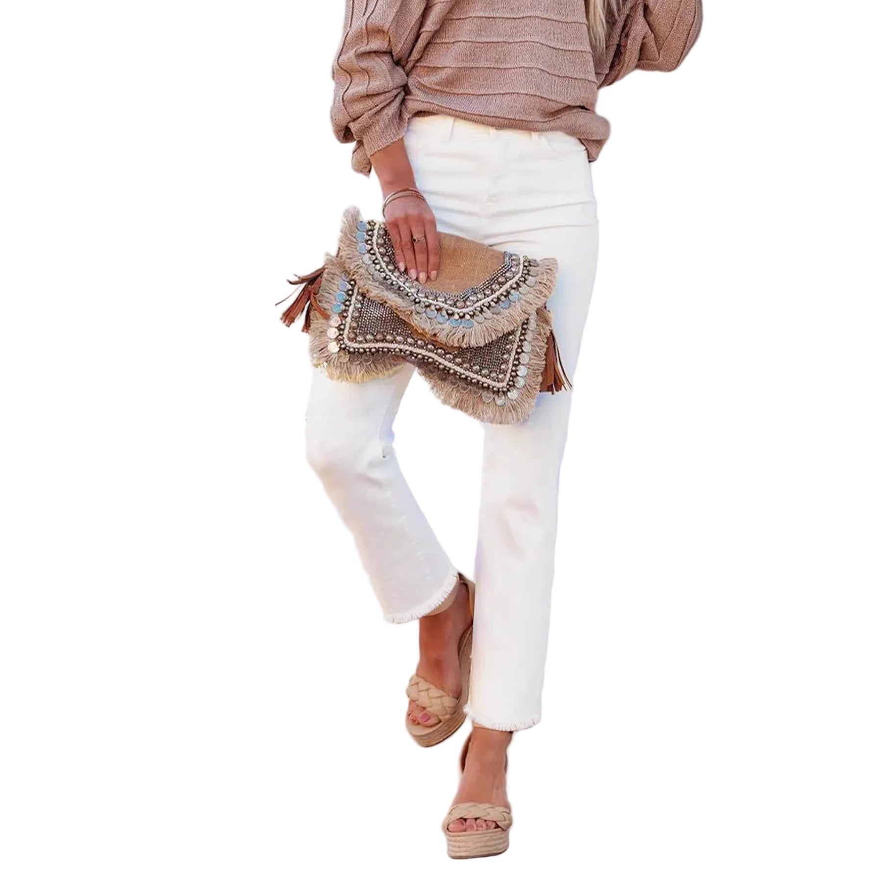 Person holding a decorative clutch bag in a minimalistic setting