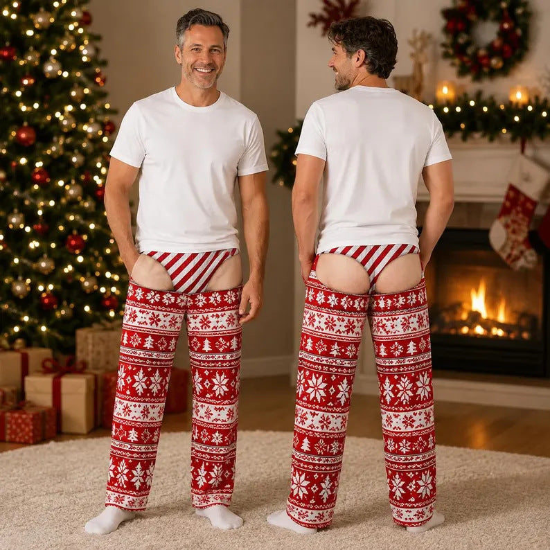 A man stands in a holiday living room showing two views of a product: a white t-shirt and red-and-white patterned pajama pants. The background features a decorated Christmas tree, fireplace, and stockings.