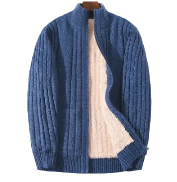 A blue ribbed knit cardigan sweater with a beige fleece lining, displayed on a wooden hanger against a plain white background.