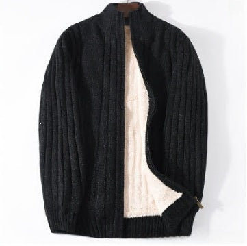 A black ribbed knit cardigan sweater with a cream-colored fleece lining, shown open against a plain white background.