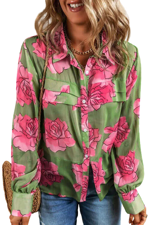 Person wearing a green and pink floral blouse with a beige background