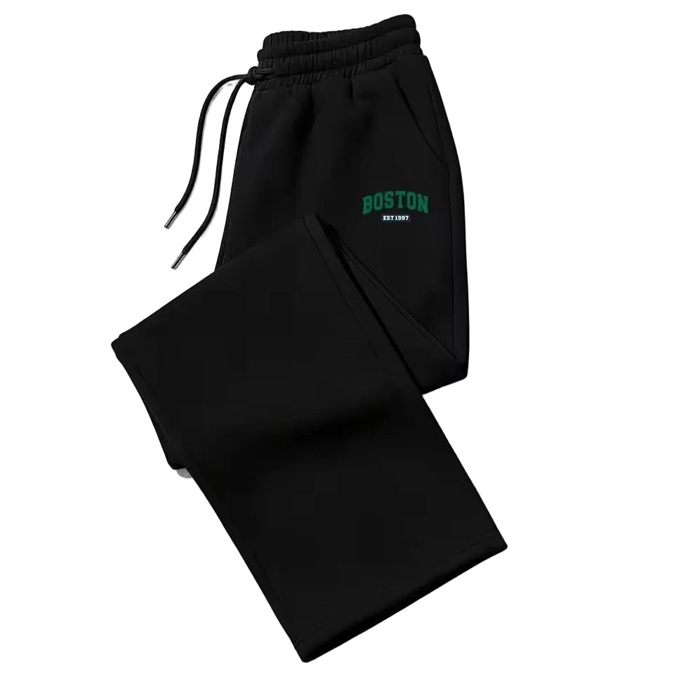 Maroon sweatpants with The North Face logo on a white background