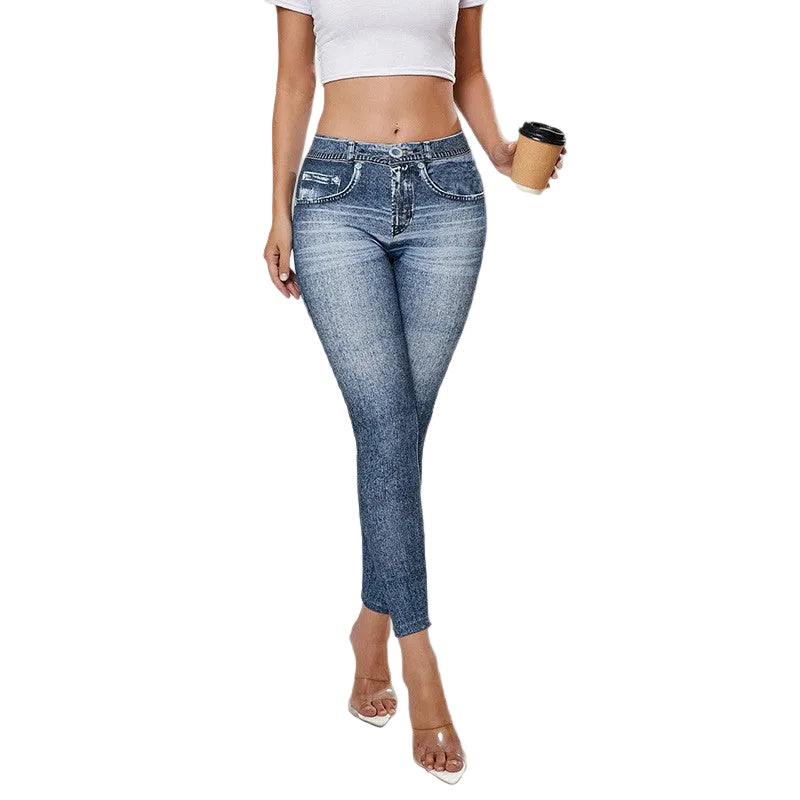 Person wearing blue jeans on a white background