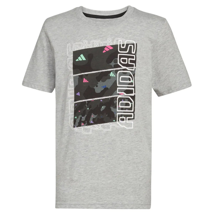 A heather gray short-sleeve t-shirt with a large front graphic featuring the Adidas logo in white outlined letters over a black camouflage pattern with small pink and green accents.