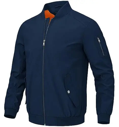 A navy blue zip-up jacket with a stand-up collar, featuring an orange lining visible inside the collar, a zippered sleeve pocket, and front flap pockets, shown on a plain white background.