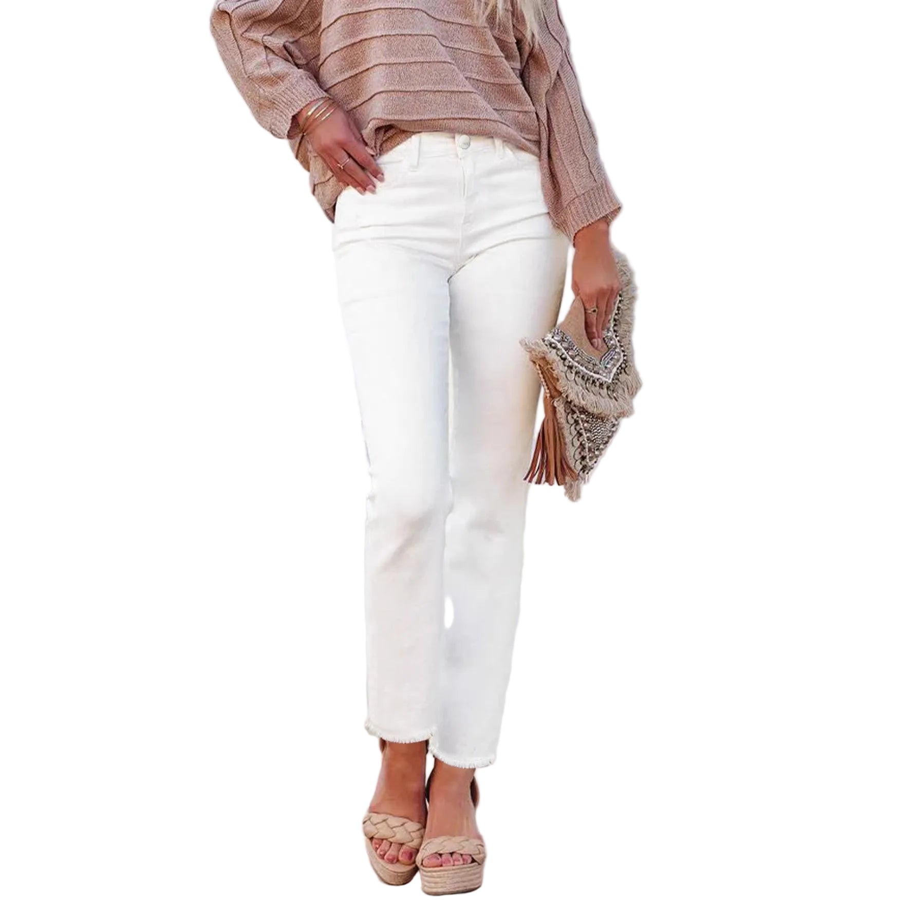 Person wearing white jeans and a beige top, holding a clutch, against a white background.
