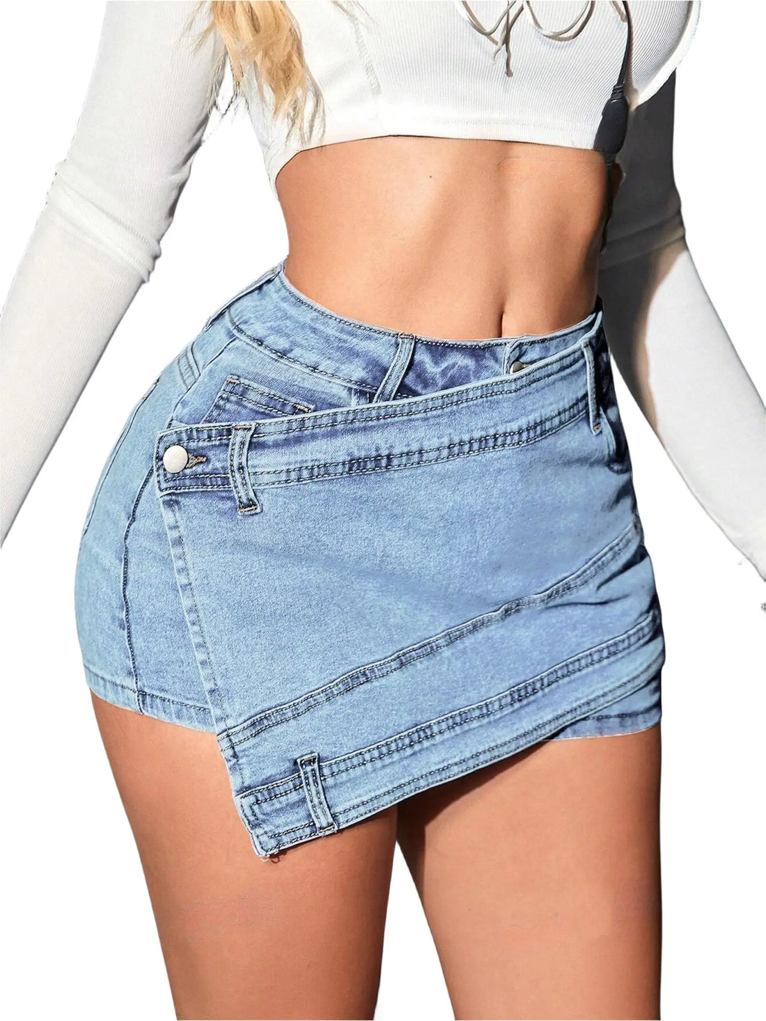 Light blue denim skirt worn by a person on a white background