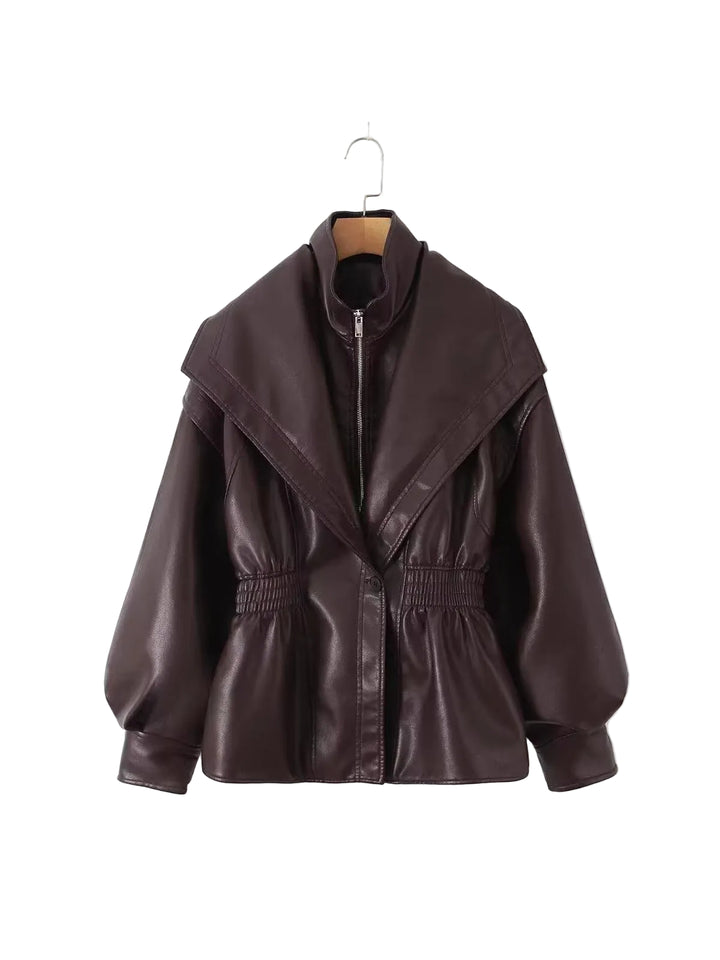 A dark brown faux leather jacket with a wide lapel collar, front zipper, and elasticized waist, hanging on a wooden hanger against a plain white background.