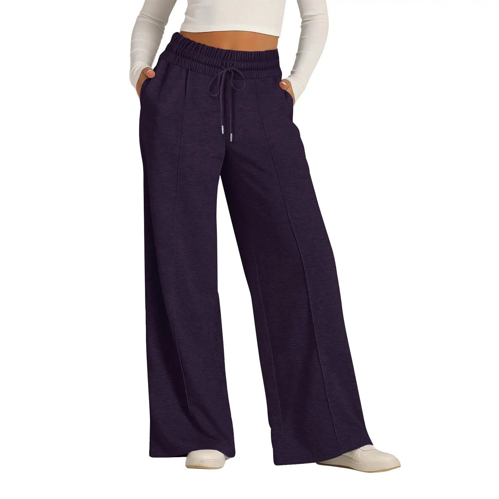 Navy blue wide-leg pants worn by a person on a white background