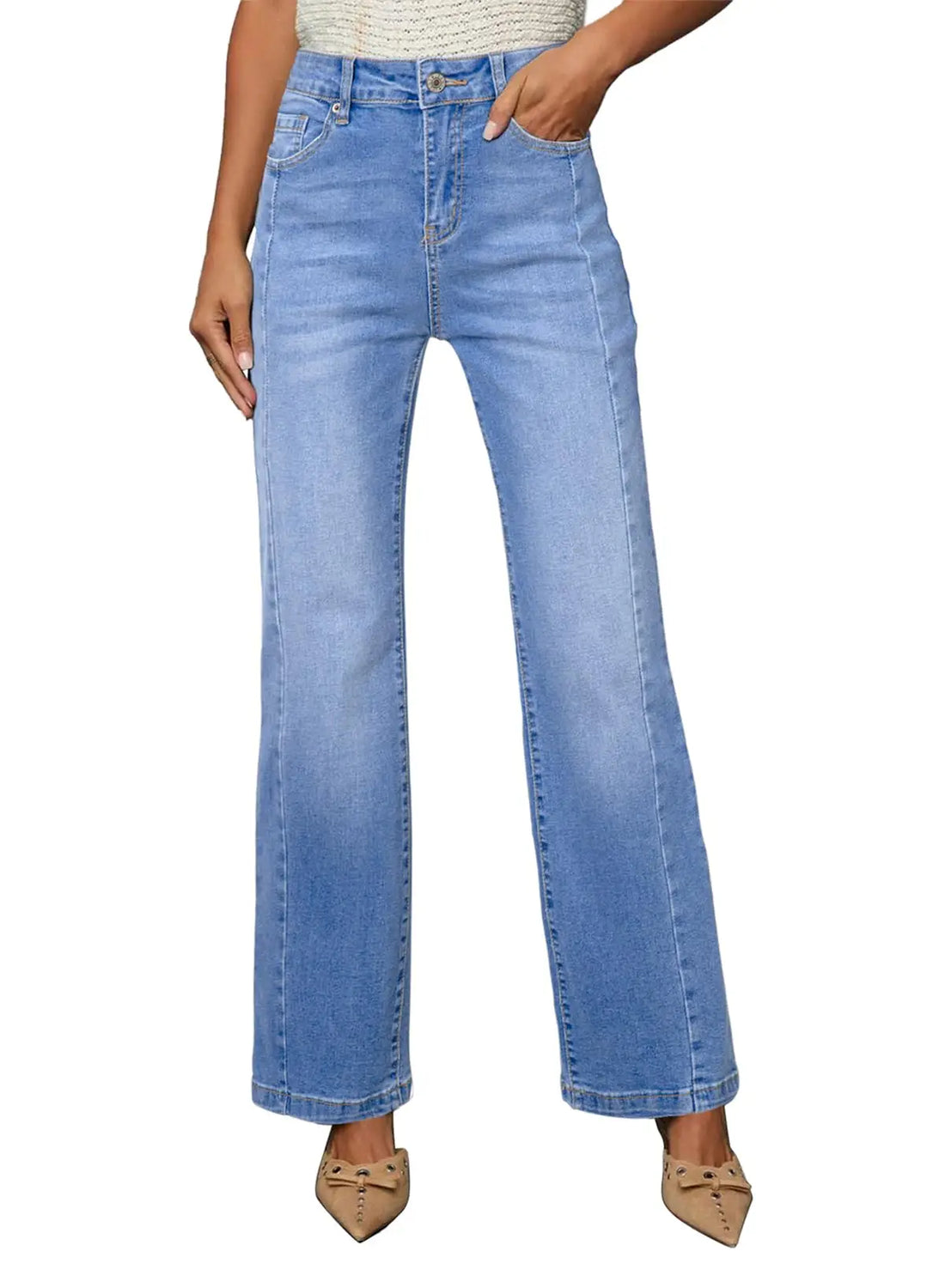 Light blue jeans worn by a person on a white background
