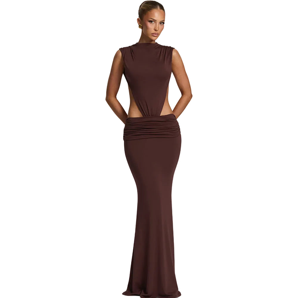 Brown evening gown on a model against a light gray background