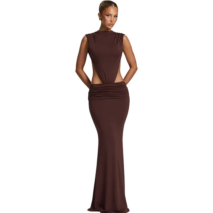 Brown evening gown on a model against a light gray background