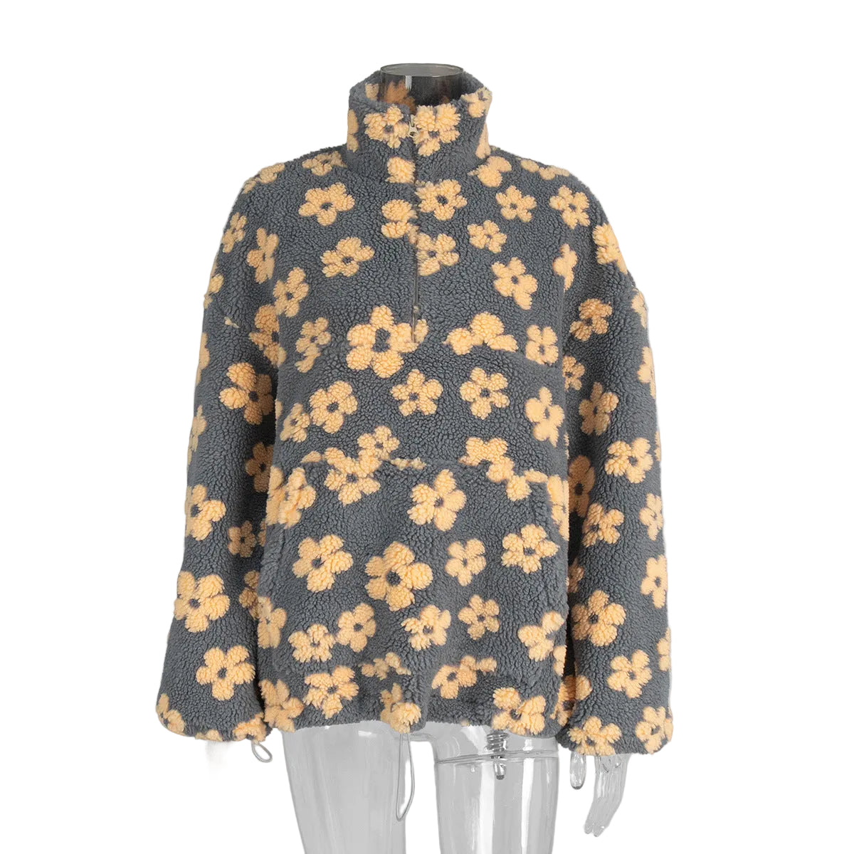 Floral patterned sweater on a mannequin against a gray background