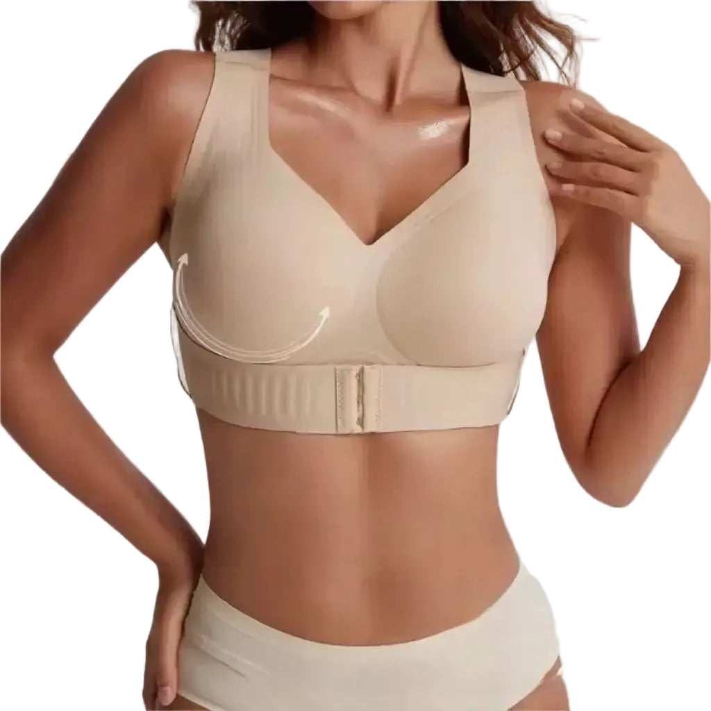 A woman wearing a beige wireless supportive bra with a wide underband and matching underwear, shown against a light gray studio background with text reading 'new minimalist design' at the bottom right.