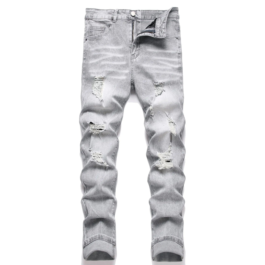 Ripped light blue jeans on a white background