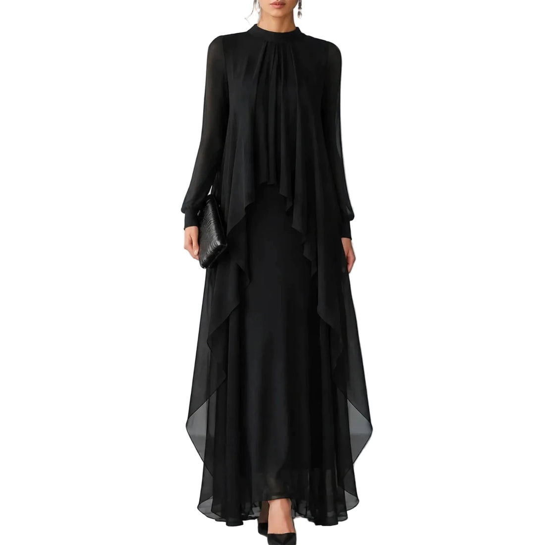 A woman models a long-sleeved black maxi dress with a high-low layered overlay and a gathered neckline, paired with black heels and holding a black clutch, set against a minimalist gray studio background.