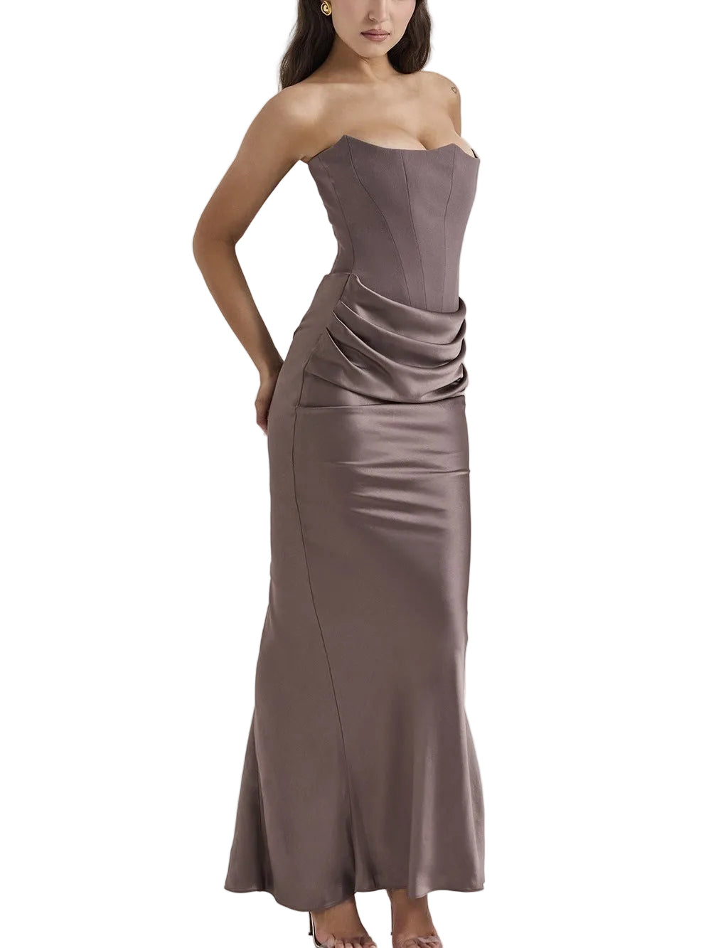 Woman wearing a strapless,收腰的晚礼服在浅灰色背景上